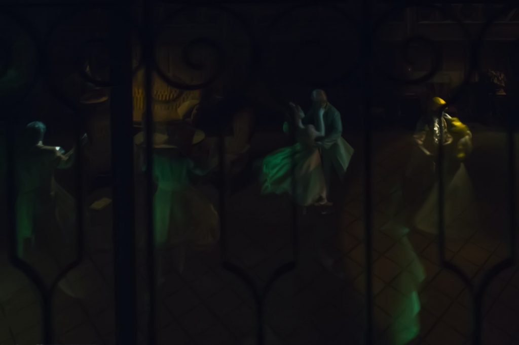 The waltzing ghosts inside of Haunted Mansion at Disneyland.